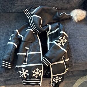 Black and White Hooded Jacket with Snowflake Design